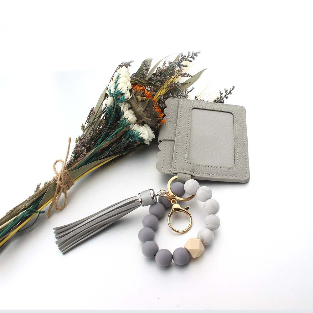 Wholesale PU Leather Tassel Silicone Wrist Coin Purse Keychain